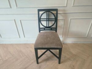 Wooden chair, cream fabric cushion, beautiful black frame.