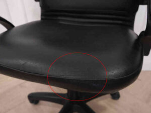 Chair, leather seat, curved backrest.