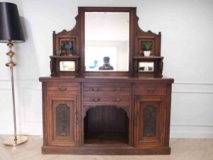 Wooden mahogany cabinet with two mirrored doors and four drawers._GEATQG8JEC