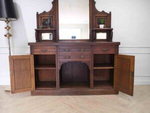 Wooden mahogany cabinet with two mirrored doors and four drawers._GEATQG8JEC