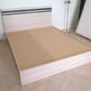 Bed brand T-DA furniture, light colored wooden frame. Black cut lines at the head of the bed, minimalist, 5 feet