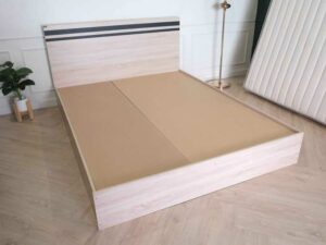 Bed brand T-DA furniture, light colored wooden frame. Black cut lines at the head of the bed, minimalist, 5 feet
