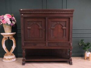 Sideboard, carved wood European work comes from Germany.