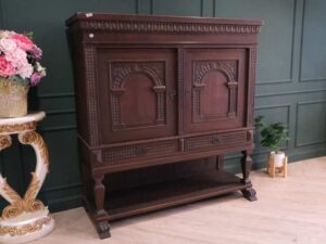 Sideboard, carved wood European work comes from Germany.