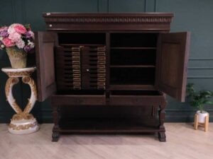 Sideboard, carved wood European work comes from Germany.