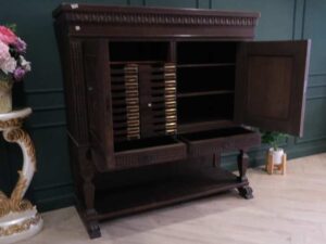 Sideboard, carved wood European work comes from Germany.