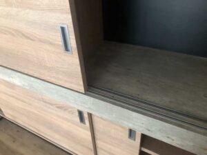 Built-in sliding door, wood pattern, minimalist style, maple color.