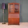 Vintage style bookcase, mahogany color. European work comes from Germany.