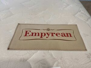 5-foot white mattress, Dunlopillo brand, Empyrean model.