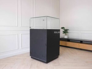 Jewelry cabinet, glass cabinet to display products Square shape, black wooden base, has 2 storage cabinets that open.