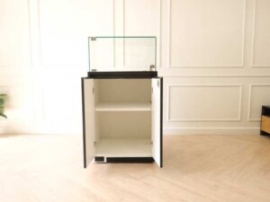 Jewelry cabinet, glass cabinet to display products Square shape, black wooden base, has 2 storage cabinets that open.