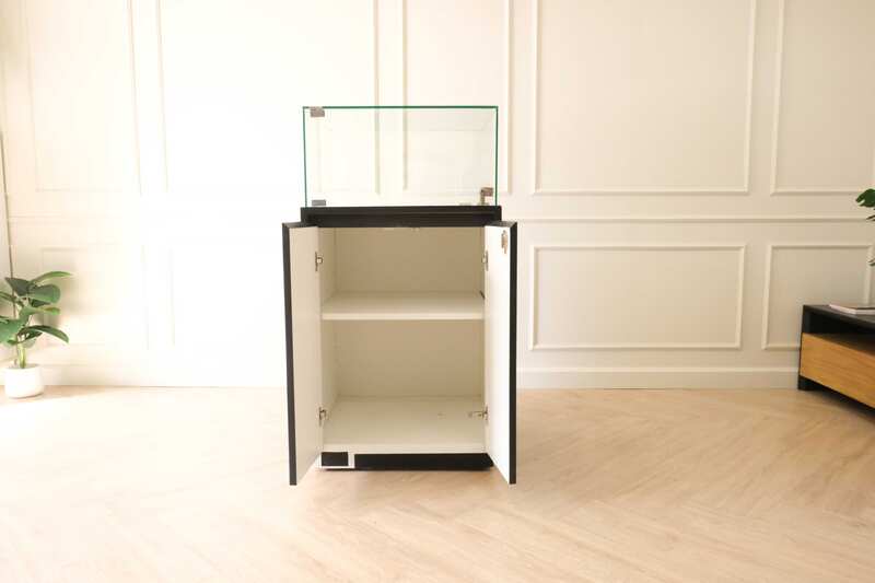 Jewelry cabinet, glass cabinet to display products Square shape, black wooden base, has 2 storage cabinets that open.