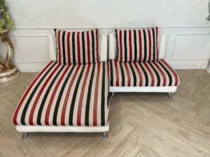 2 seat sofa, cream leather seats Covered with striped fabric