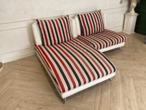 2 seat sofa, cream leather seats Covered with striped fabric