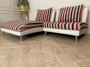 2 seat sofa, cream leather seats Covered with striped fabric