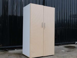 Wooden cabinet with 2 doors, cream color, wavy design.