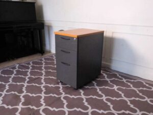 Wooden filing cabinet, 3 drawers, gray color, wooden top, no wheels.