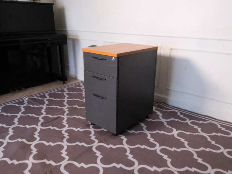 Wooden filing cabinet, 3 drawers, gray color, wooden top, no wheels.