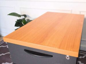 Wooden filing cabinet, 3 drawers, gray color, wooden top, no wheels.