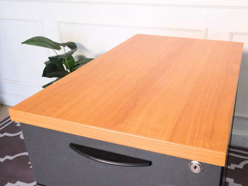 Wooden filing cabinet, 3 drawers, gray color, wooden top, no wheels.