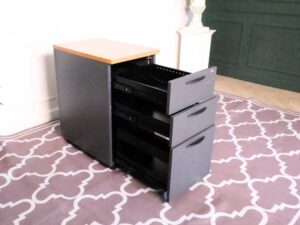Wooden filing cabinet, 3 drawers, gray color, wooden top, no wheels.