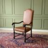 Armchair covered in brown leather, European made from Germany.