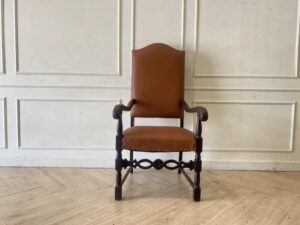 Armchair covered in brown leather, European made from Germany.
