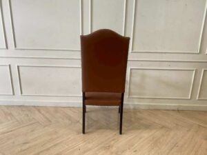 Armchair covered in brown leather, European made from Germany.