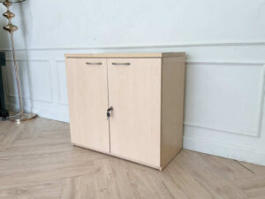 Cabinet for storing documents or items, two-door cabinet, light brown wooden frame.