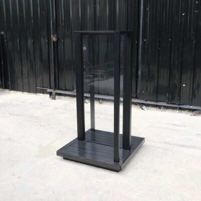 Product shelves, 2 sides, glass divider in the middle Black steel frame, wooden base