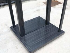 Product shelves, 2 sides, glass divider in the middle Black steel frame, wooden base