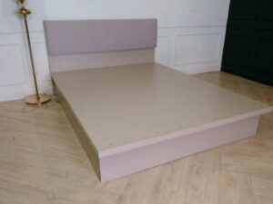 5 foot bed, wooden frame, fabric cushioned headboard, gray color.