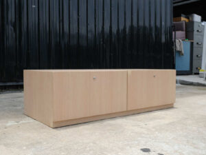 Multi-purpose storage cabinet, low shape, brown wood frame, wood pattern, 2 drawers.
