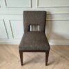 Wooden chair, dark gray fabric cushion, beautiful frame, cushioned backrest.