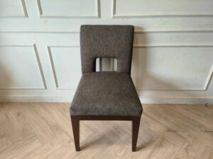 Wooden chair, dark gray fabric cushion, beautiful frame, cushioned backrest.