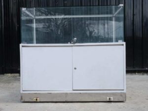 Jewelry cabinet, glass product display cabinet with 2 opening doors, white wooden frame, with LED lights along the edge of the glass.