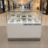 Jewelry cabinet, glass product display cabinet with 2 opening doors, white wooden frame, with LED lights along the edge of the glass.