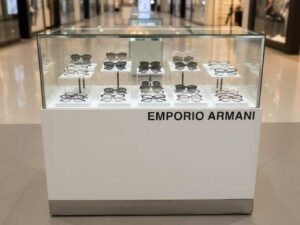Jewelry cabinet, glass product display cabinet with 2 opening doors, white wooden frame, with LED lights along the edge of the glass.