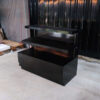 3-tiered product shelves, black high-gloss surface There are 2 storage cabinets in the back that open.