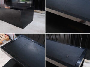 3-tiered product shelves, black high-gloss surface There are 2 storage cabinets in the back that open.