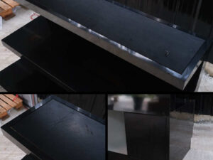 3-tiered product shelves, black high-gloss surface There are 2 storage cabinets in the back that open.