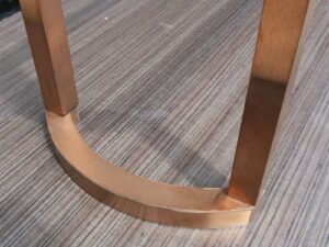 Display stand, display table (small), glass top, rose gold stainless steel frame.