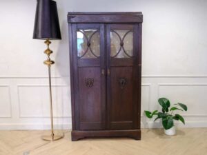 Wardrobe with 2 doors, vintage style, walnut wood color, European workmanship, sourced from Germany.