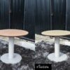 Round table, white steel legs, wooden top, light cream/beech wood color.