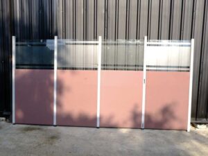 Partition, steel frame, glass top, brown color.