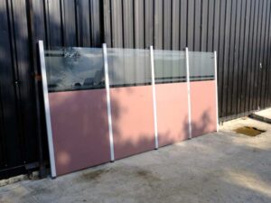 Partition, steel frame, glass top, brown color.
