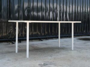 Multi-purpose table, white table, wooden top, white steel legs.