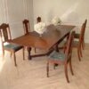 Extendable table set with 6 chairs, blue fabric cushions, European craftsmanship, sourced from Germany.