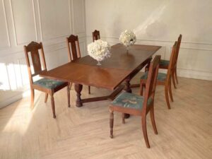 Extendable table set with 6 chairs, blue fabric cushions, European craftsmanship, sourced from Germany.