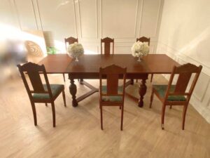 Extendable table set with 6 chairs, blue fabric cushions, European craftsmanship, sourced from Germany.